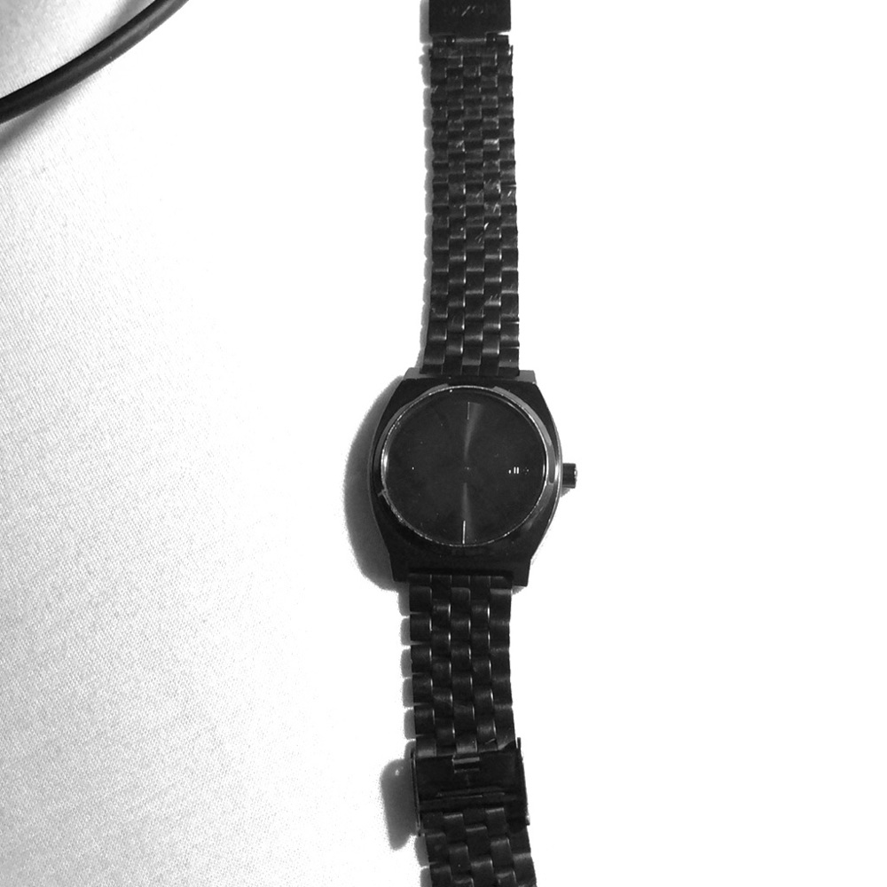 Black Nixon waterproof watch